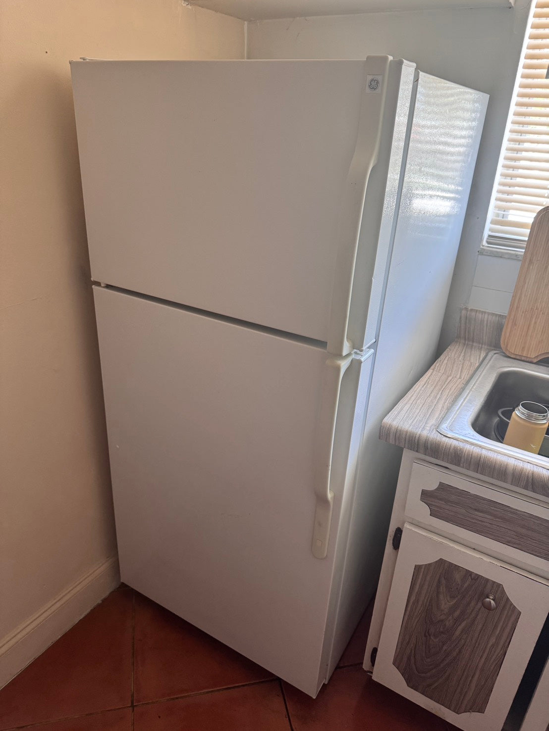 Product Sold – GE White Top & Bottom Refrigerator + Whirlpool White Electric Stove Product Sold – GE White Top & Bottom Refrigerator + Whirlpool White Electric Stove